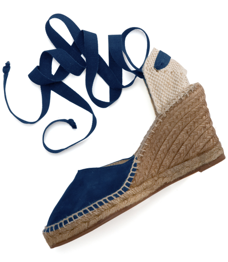 Suede wedge with leather lining and rubber sole. 3 1/2" heel. Made in Spain.
