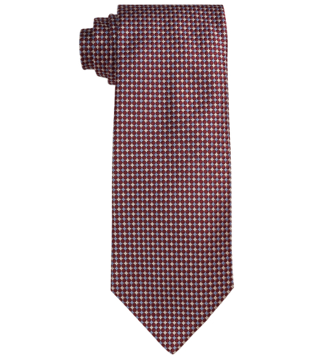 Pure silk woven in Italy. 4" width. Self-loop. Dry clean. Made in the USA.