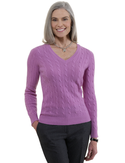 Italian cashmere. All-over cable with a ribbed trim. Dry clean. Imported.