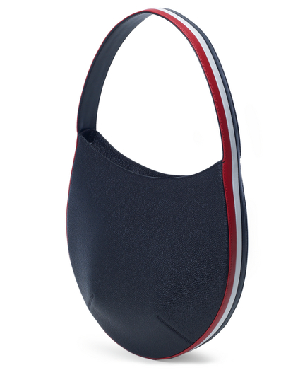 Genuine pebble leather bag has red, white and navy stripes down side. 18.5" x 2" x 12". Imported.
