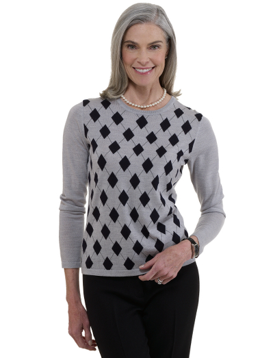 Extrafine Italian merino wool. Placed argyle. Rib trims. Crewneck. Dry clean. Imported.