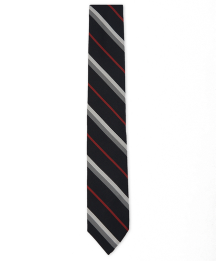 Silk and cotton from Italy. 2 1/4" width. Grosgrain trim at neck. Made in the USA.