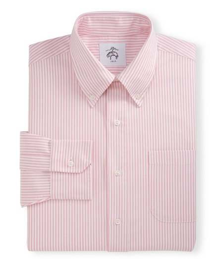 Pure cotton oxford.  Button-down collar. Mitered cuffs.  Side gussets.Mother-of-pearl buttons. Locker loop at back neck. Machine wash. Made in the USA.