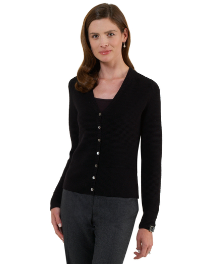 Extrafine Italian merino wool. V-neck. Rib trims. Mother-of-pearl buttons. Dry clean. Imported.