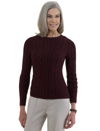 Extrafine Italian merino wool. Crewneck  with rib trims.  Placed cable with seed stitch. Dry clean. Imported.