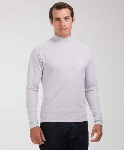 Breathable fabric with extra-soft handfeel. Fabric wicks moisture away from skin and dries quickly to increase comfort and help regulate the body's temperature. Signature ProSport  logo. Small zip pocket for miscellaneous items. Machine wash. Imported.
