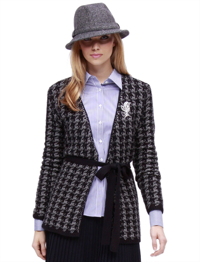 Silk/cashmere. All-over houndstooth pattern. Rib trim at cuffs and hem. Self belt. Dry clean. Imported.