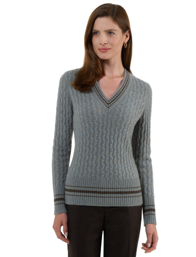 Cashmere v-neck. Rib trim at neck, hem and cuffs. Contrast stripes at neck, hem and cuffs. Dry clean. Imported.