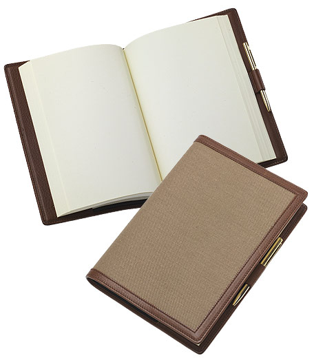 Distinctive accessories crafted and trimmed in genuine leather from Florence, Italy. Overlaid with oxford cloth inspired by the famous Brooks Brothers oxford cloth shirt. Includes pen. 15" x 21".