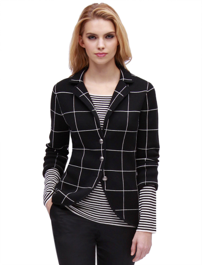 Extrafine Italian merino wool in windowpane pattern. Antiqued silver-toned buttons. Dry clean. Imported.