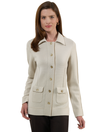 Extrafine Italian merino wool. Front and back princess seams. Two patch pockets. Mother-of-pearl buttons. Collared. Full merino stitch. Dry clean. Imported.