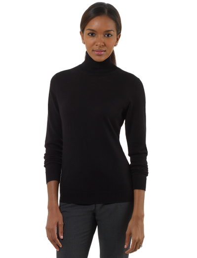 Extrafine Italian merino wool. Rib trim at cuffs and hem. Dry clean. Imported.