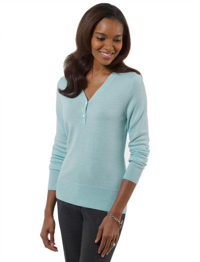 Extrafine Italian merino wool. Henley neckline. Two functional mother-of-pearl buttons. Dry clean. Imported.