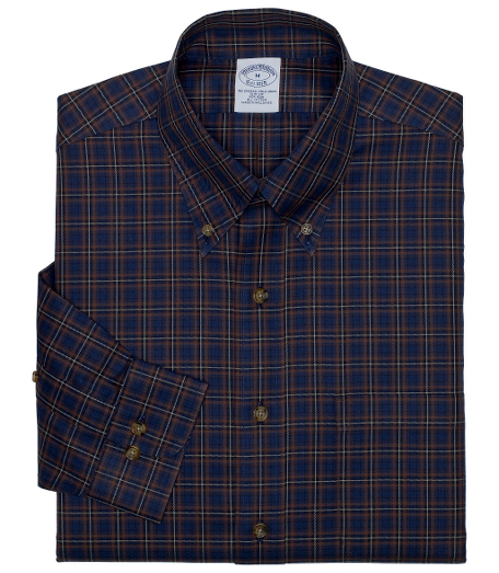 Pure cotton twill. Made with pucker-free seams and treated to remain virtually wrinkle-free. The original Polo� button-down collar. Superdurable faux horn logo buttons. Center back pleat and signature shirring at barrel cuffs. Left chest pocket. Machine wash. Imported. Also available in Traditional        fit.