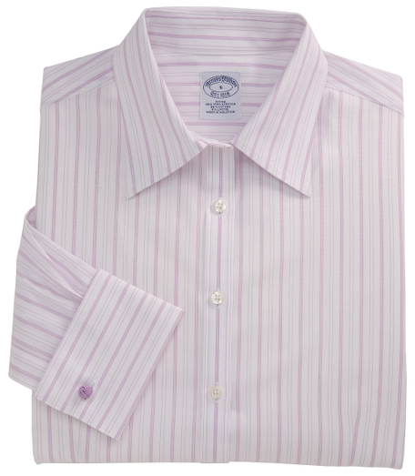 Fitted silhouette, slightly tailored for a slimmer appearance.  Woven in cotton specially treated to remain virtually wrinkle-free, with a touch of  DOW XLA for stretch. Traditional placket. Pucker-free seams. Front and back darts. Forward point collar. French cuffs. Machine wash. Imported. Also available in Petites.