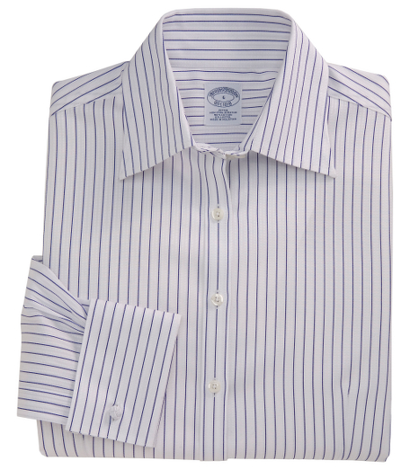 Our fitted silhouette, slightly tailored for a slimmer appearance. Woven in cotton with a touch of  DOW XLA for stretch, treated to remain virtually wrinkle-free. Traditional placket. Pucker-free seams. Front and back darts. Forward point collar. French cuffs. Machine wash. Imported.