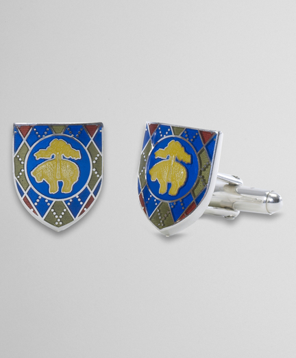 Our iconic Golden Fleece on a classic argyle pattern. Sterling silver and enamel. Swivel back. Made in England.