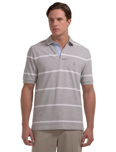 Our classic short sleeve polo shirt knitted in ultrafine 2-ply cotton for superior softness. A performance finish enhances shape retention and resistance to shrinking, fading and pilling. Embroidered chest logo. Side vents. Machine wash. Imported.