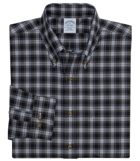 Pure cotton twill. Made with pucker-free seams and treated to remain virtually wrinkle-free. The original Polo� button-down collar. Faux horn buttons. Signature shirring at barrel cuffs. Machine wash. Imported. Also available in Taditional fit.