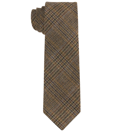 Pure wool woven in Italy. 2 7/8" width. Self-loop. Dry clean. Made in the USA.