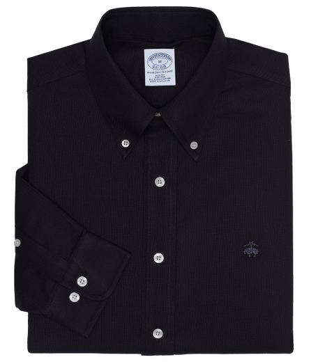 Pure lightweight Suprima� oxford. Made with pucker-free seams and treated to remain virtually wrinkle-free. The original Polo� button-down collar. Superdurable logo buttons.  Center back pleat and signature shirring at barrel cuffs. Machine wash. Imported. Also available in Traditional fit.