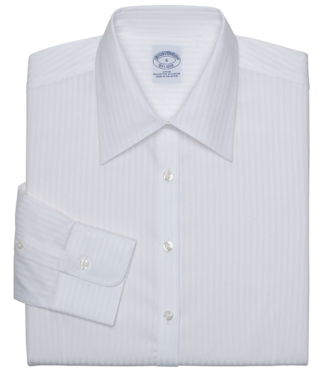 Fitted silhouette, slightly tailored for a slimmer appearance. Woven in cotton. Traditional placket. Pucker-free seams. Front and back darts. Forward point collar and shirred barrel cuffs. Machine wash. Imported. Also available in Petites.
