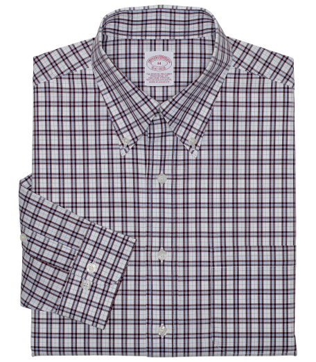 Pure cotton broadcloth. Made with pucker-free seams and treated to remain virtually wrinkle-free. The original Polo� button-down collar. Superdurable logo buttons. Center back pleat and signature shirring at barrel cuffs. Left chest pocket. Machine wash. Imported. Also available in Slim fit.
