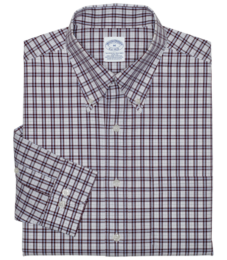 Pure cotton broadcloth. Made with pucker-free seams and treated to remain virtually wrinkle-free. The original Polo� button-down collar. Superdurable logo buttons.  Center back pleat and signature shirring at barrel cuffs. Left chest pocket. Machine wash. Imported. Also available in Traditional fit.
