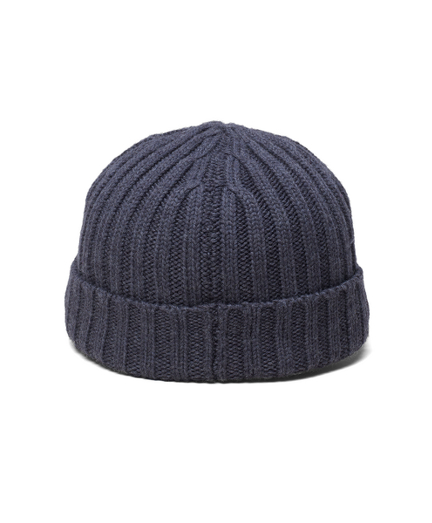 Rib knit in pure merino wool. Treated with a water-repellent Teflon finish to keep you warm and dry. Dry clean. Imported.