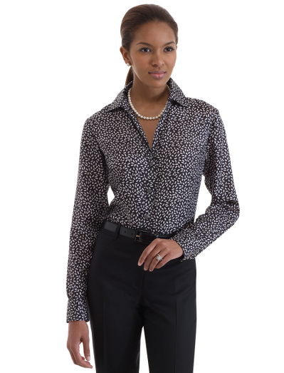 Our most feminine silhouette, with an elongated neckline and a slim fit. Front and back princess seams. Traditional placket. 26" center back length. Dry clean. Imported.