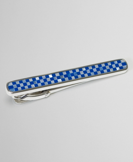 Sterling enamel with lapis and mother-of pearl.  Imported.