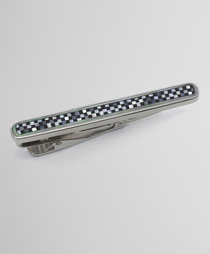 Sterling enamel with onyx and mother-of pearl.  Imported.