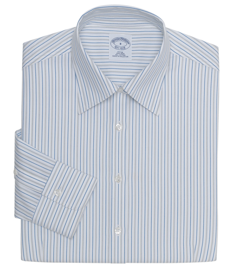 Fitted silhouette, slightly tailored for a slimmer appearance. Woven in cotton with a touch of  DOW XLA  for stretch, treated to remain virtually wrinkle-free. Front and back darts. Traditional placket. Forward point collar and French cuffs. Machine wash. Imported.