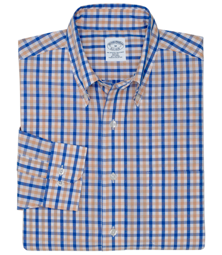 Pure cotton broadcloth. Made with pucker-free seams and treated to remain virtually wrinkle-free. The original Polo� button-down collar. Superdurable logo buttons. Center back pleat and signature shirring at barrel cuffs. Left chest pocket. Machine wash. Imported. Also available in Traditional fit.