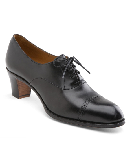 Calfskin. Handmade. Leather sole. 2" heel. Leather lined. Captoe detail with lace-up. Made in Spain.