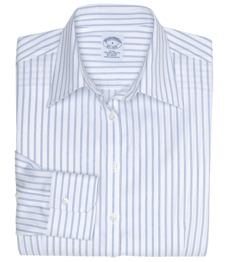 Fitted silhouette, slightly tailored for a slimmer appearance. Woven in cotton with a touch of  DOW XLA for stretch, treated to remain virtually wrinkle-free. Front and back darts. Traditional placket. Forward point collar and barrel cuff. Machine wash. Imported.