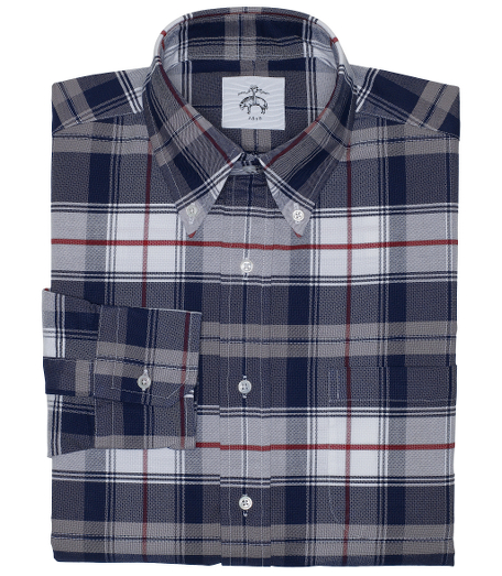 Pure cotton oxford. Button-down collar. Mitered cuffs. Side gussets. Mother-of-pearl buttons. Locker  loop at back neck. Machine wash warm. Made in the USA.