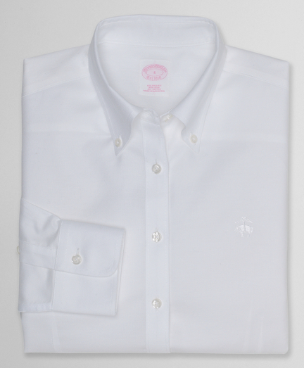 Tailored fit, our slimmest silhouette, woven in cotton specially treated to remain virtually wrinkle-free, with a touch of  DOW XLA for stretch. Button-down collar and shirred barrel cuffs. Traditional placket, slightly longer shirttail and pucker-free seams. Front and back darts. Machine wash. Imported.