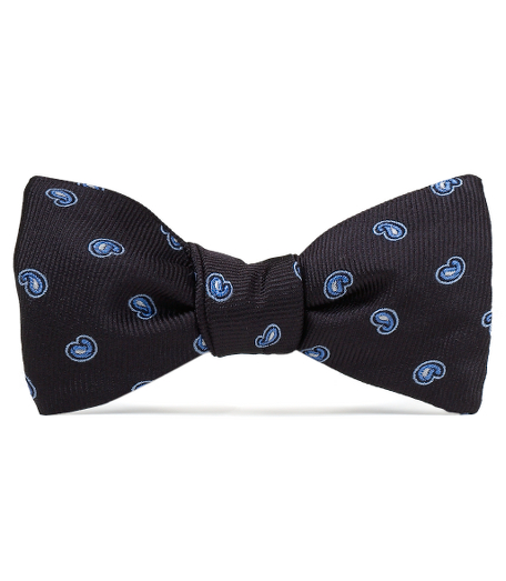 Pure silk woven in Italy. Self-tie bow. Dry clean. Made in the USA.