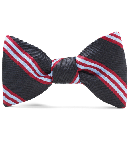 Pure silk woven in England. Self tie. Dry clean. Made in the USA.