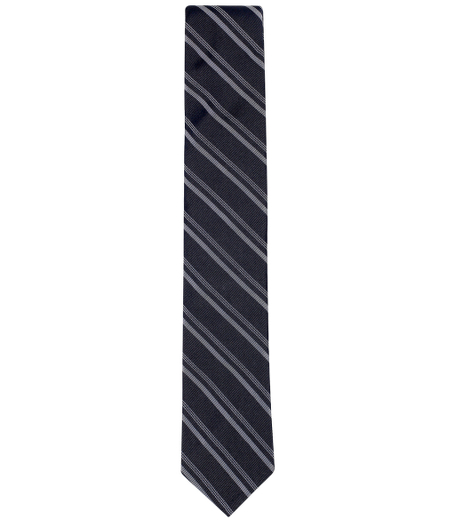 Silk and cotton from Italy. 2 1/4" width. Grosgrain trim at neck. Dry clean. Made in the USA.
