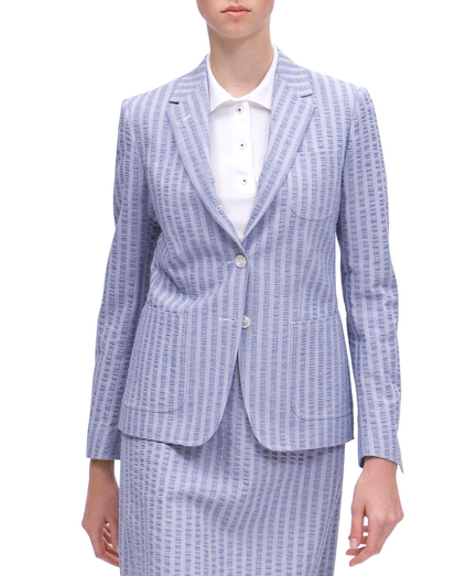 Cotton. 3-button. Center back vent. Three patch pockets. Lined in 100% Bemberg cupro. Non-functional sleeve buttons. Half canvas construction. Signature locker loop at back neck. Mother-of-pearl buttons. Dry clean. Made in Italy.