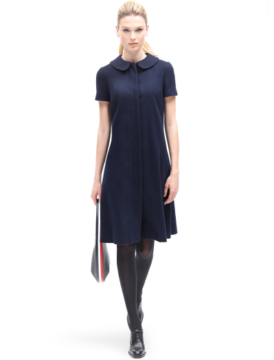Pure wool lined in 100% Bemberg. Genuine horn buttons. Falls below the knee. Dry clean. Made in Italy.