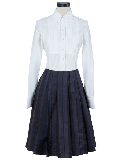 Pure cotton top with a pure silk bottom. 100% Bemberg lining. Mother-of-pearl buttons. Falls below the knee. Dry clean. Made in Italy.