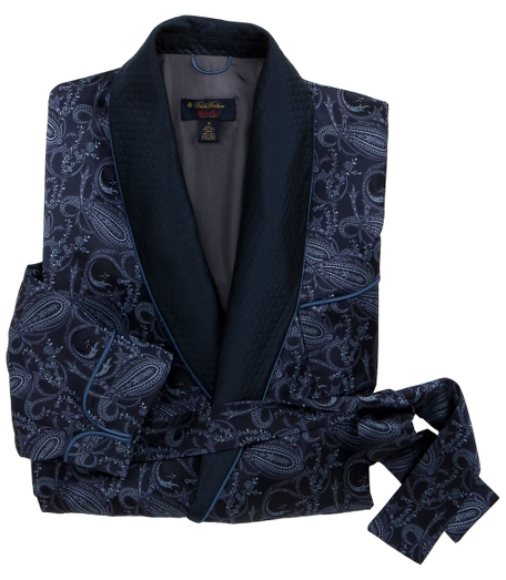 Leisurely luxury has never felt more indulgent than with our heavy silk jacquard dressing gown.  Lined in an additional layer of pure silk, the elegant cut assures extra ease.  Impeccable details include cuffed sleeves, crisp piped edges, a quilted shawl collar, and removable belt.  Two roomy patch pockets.  Calf-length.  Dry clean.  Hand-tailored in England.