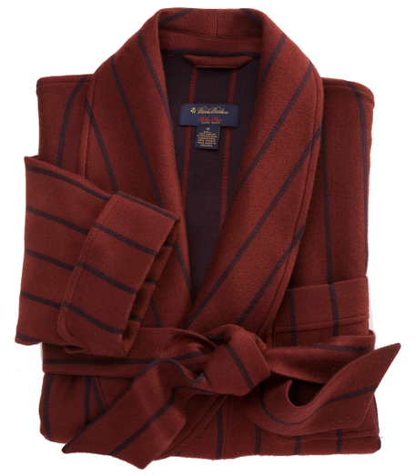 Luxurious extrafine merino wool robe is generously cut for comfort. Calf-length style with shawl collar, removable belt and patch pockets.  Lined sleeves.  Hand made in England.  Dry clean.