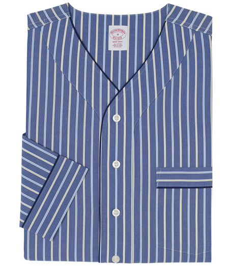 Pure cotton broadcloth. Comfortably styled v-neck, button-down front and long sleeves. Chest patch pocket. Piped edges. Rounded hem with side vents. Machine wash. Imported.
