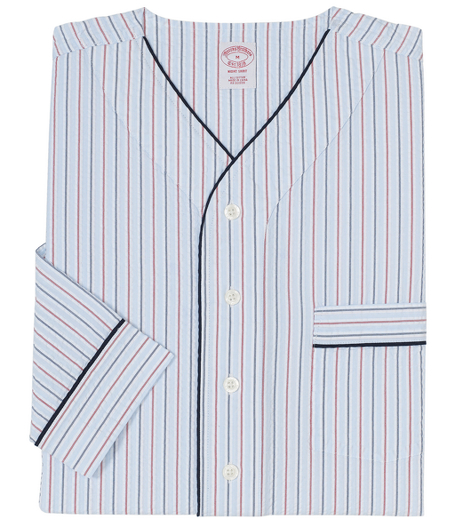 Pure cotton broadcloth. Comfortably styled v-neck, button down front and long sleeves. Chest patch pocket. Piped edges. Rounded hem with side vents. Machine wash. Imported.