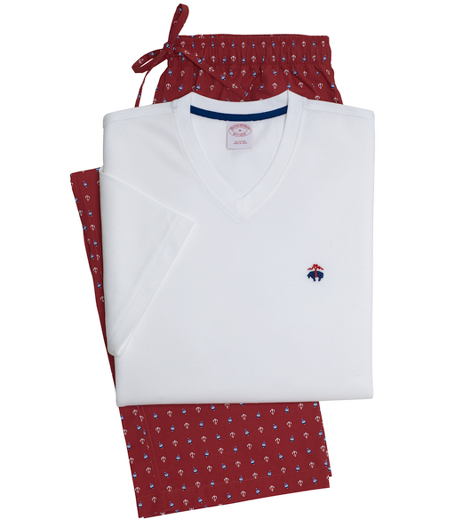 Solid short-sleeve cotton knit v-neck shirt with embroidered Golden Fleece logo on chest and contrasting tape on neck and side vents. Cotton broadcloth lounge pants with drawstring elastic waist, side seam, and back patch pocket. Machine wash. Imported.