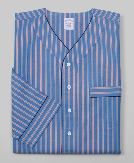 Pure cotton broadcloth. Comfortably styled v-neck, button-down front and long sleeves. Chest patch pocket. Rounded hem with side vents. Machine wash. Imported.